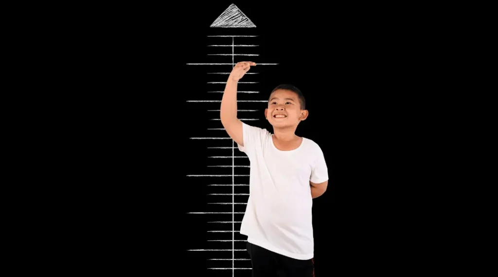 a child measuring his height