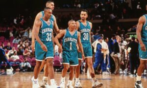 Sports person Muggsy bogues basketball player with some fellow player playing in the ground